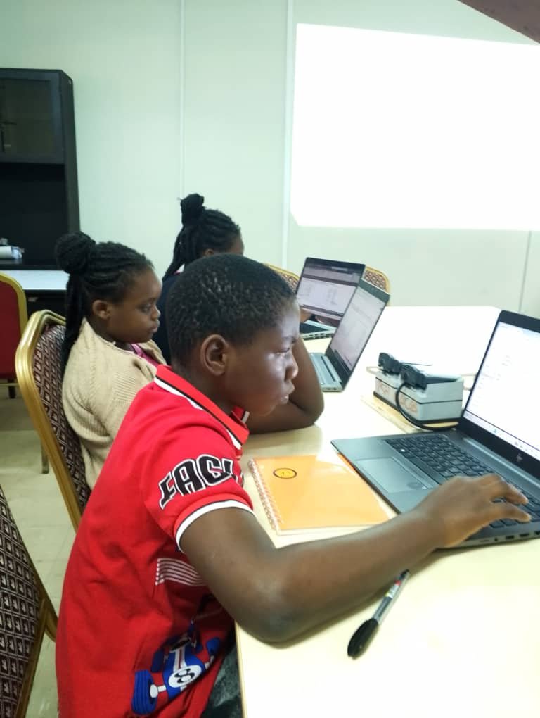 Learners discussing programming concepts