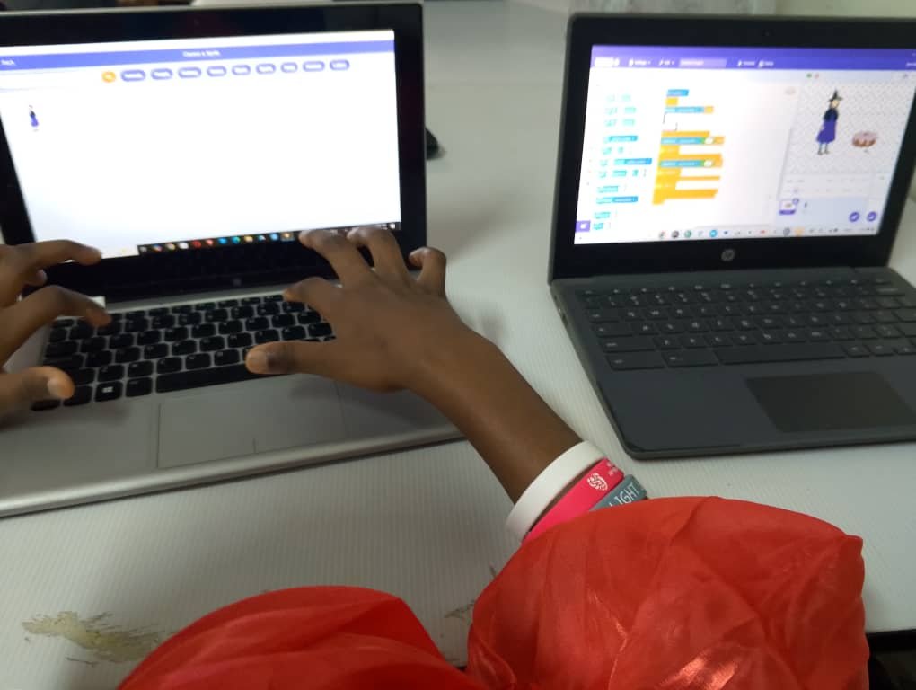 Student deeply focused on a web application project